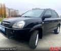 Черный Хендай Туксон, объемом двигателя 2 л и пробегом 168 тыс. км за 7700 $, фото 2 на Automoto.ua