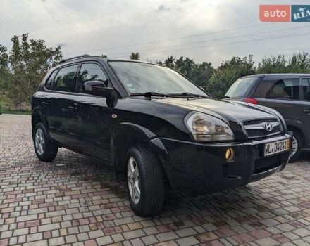 Чорний Хендай Туксон, об'ємом двигуна 2 л та пробігом 217 тис. км за 7700 $, фото 4 на Automoto.ua