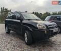 Чорний Хендай Туксон, об'ємом двигуна 2 л та пробігом 217 тис. км за 7700 $, фото 4 на Automoto.ua