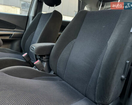 Хендай Туксон 2009 в Киеве на Automoto.ua Черный Хендай Туксон, объемом двигателя 2 л и пробегом 110 тыс. км за 8700 $, фото 26 на Automoto.ua