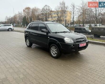 Черный Хендай Туксон, объемом двигателя 2 л и пробегом 237 тыс. км за 8350 $, фото 11 на Automoto.ua