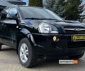 Чорний Хендай Туксон, об'ємом двигуна 2 л та пробігом 246 тис. км за 7999 $, фото 1 на Automoto.ua