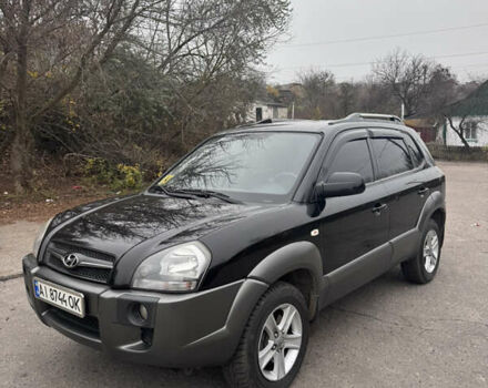 Черный Хендай Туксон, объемом двигателя 1.98 л и пробегом 120 тыс. км за 8500 $, фото 7 на Automoto.ua