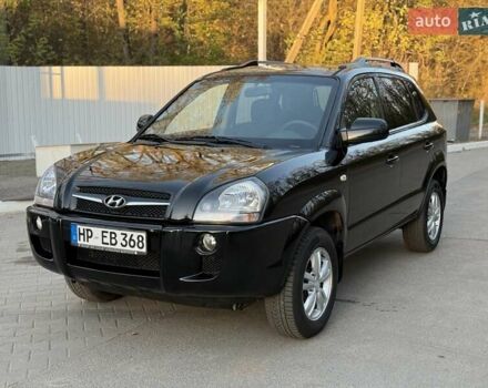 Черный Хендай Туксон, объемом двигателя 2 л и пробегом 148 тыс. км за 8700 $, фото 2 на Automoto.ua