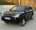 Черный Хендай Туксон, объемом двигателя 2 л и пробегом 148 тыс. км за 8700 $, фото 2 на Automoto.ua