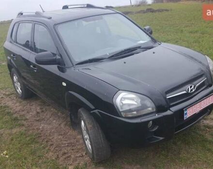 Черный Хендай Туксон, объемом двигателя 2 л и пробегом 198 тыс. км за 8200 $, фото 3 на Automoto.ua