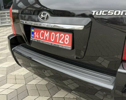 Черный Хендай Туксон, объемом двигателя 2 л и пробегом 191 тыс. км за 8500 $, фото 18 на Automoto.ua