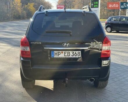 Черный Хендай Туксон, объемом двигателя 2 л и пробегом 148 тыс. км за 8700 $, фото 40 на Automoto.ua