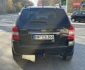 Черный Хендай Туксон, объемом двигателя 2 л и пробегом 148 тыс. км за 8700 $, фото 40 на Automoto.ua