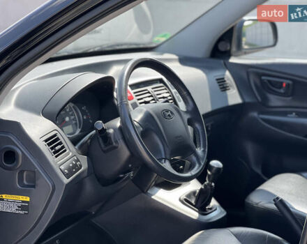 Чорний Хендай Туксон, об'ємом двигуна 2 л та пробігом 163 тис. км за 9199 $, фото 21 на Automoto.ua