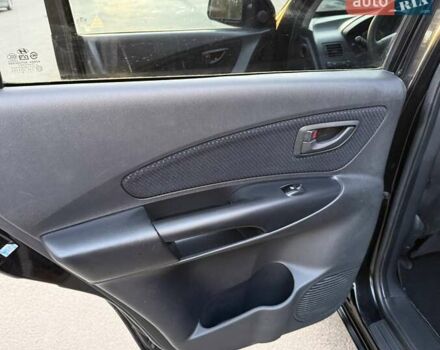 Черный Хендай Туксон, объемом двигателя 2 л и пробегом 148 тыс. км за 8700 $, фото 14 на Automoto.ua