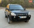 Черный Хендай Туксон, объемом двигателя 2 л и пробегом 148 тыс. км за 8700 $, фото 1 на Automoto.ua