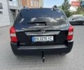 Черный Хендай Туксон, объемом двигателя 1.98 л и пробегом 186 тыс. км за 8100 $, фото 6 на Automoto.ua