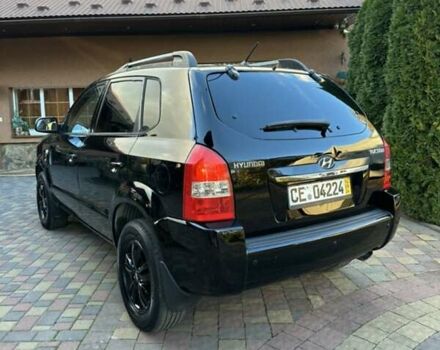 Черный Хендай Туксон, объемом двигателя 1.98 л и пробегом 198 тыс. км за 8250 $, фото 11 на Automoto.ua