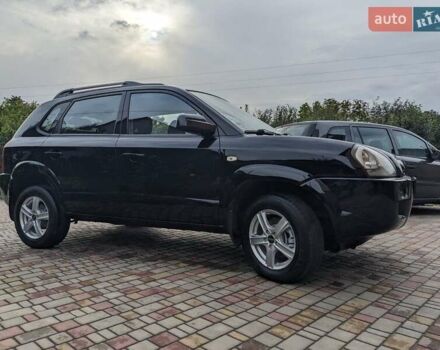 Чорний Хендай Туксон, об'ємом двигуна 2 л та пробігом 217 тис. км за 7700 $, фото 7 на Automoto.ua