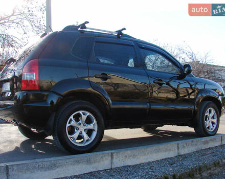 Черный Хендай Туксон, объемом двигателя 2 л и пробегом 162 тыс. км за 8200 $, фото 9 на Automoto.ua