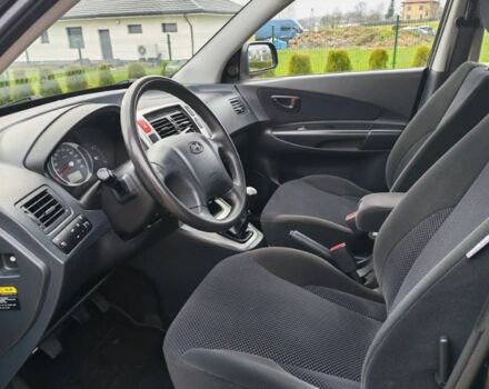 Чорний Хендай Туксон, об'ємом двигуна 1.98 л та пробігом 148 тис. км за 6199 $, фото 9 на Automoto.ua