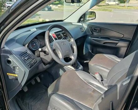 Чорний Хендай Туксон, об'ємом двигуна 1.98 л та пробігом 242 тис. км за 8900 $, фото 8 на Automoto.ua