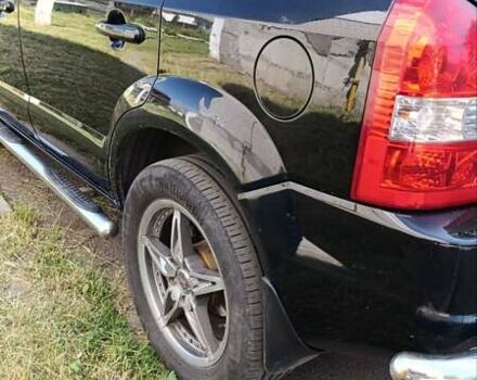 Черный Хендай Туксон, объемом двигателя 2 л и пробегом 226 тыс. км за 8700 $, фото 12 на Automoto.ua