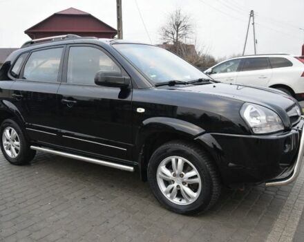 Черный Хендай Туксон, объемом двигателя 2 л и пробегом 184 тыс. км за 5480 $, фото 3 на Automoto.ua