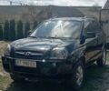 Черный Хендай Туксон, объемом двигателя 2 л и пробегом 182 тыс. км за 8800 $, фото 1 на Automoto.ua