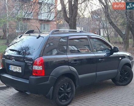 Черный Хендай Туксон, объемом двигателя 1.99 л и пробегом 240 тыс. км за 8700 $, фото 7 на Automoto.ua