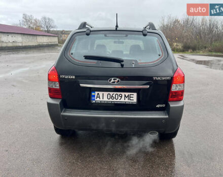 Хендай Туксон 2009 в Шостке на Automoto.ua Черный Хендай Туксон, объемом двигателя 1.98 л и пробегом 204 тыс. км за 9299 $, фото 10 на Automoto.ua