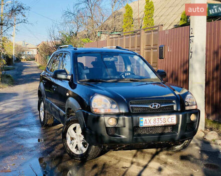 Черный Хендай Туксон, объемом двигателя 1.99 л и пробегом 95 тыс. км за 8500 $, фото 6 на Automoto.ua