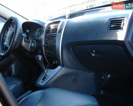 Черный Хендай Туксон, объемом двигателя 2 л и пробегом 162 тыс. км за 8200 $, фото 20 на Automoto.ua