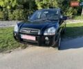 Черный Хендай Туксон, объемом двигателя 2 л и пробегом 199 тыс. км за 8300 $, фото 1 на Automoto.ua
