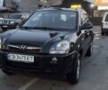 Черный Хендай Туксон, объемом двигателя 2 л и пробегом 180 тыс. км за 7600 $, фото 1 на Automoto.ua