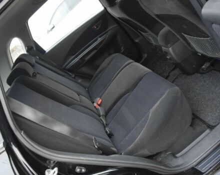 Черный Хендай Туксон, объемом двигателя 2 л и пробегом 184 тыс. км за 5480 $, фото 14 на Automoto.ua