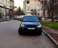Черный Хендай Туксон, объемом двигателя 2 л и пробегом 240 тыс. км за 8700 $, фото 1 на Automoto.ua
