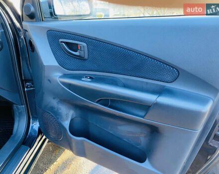 Черный Хендай Туксон, объемом двигателя 1.99 л и пробегом 95 тыс. км за 8700 $, фото 27 на Automoto.ua