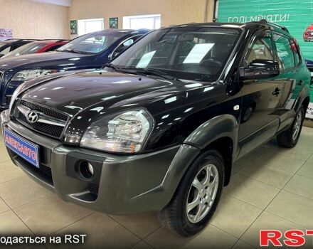 Черный Хендай Туксон, объемом двигателя 2 л и пробегом 160 тыс. км за 8800 $, фото 1 на Automoto.ua