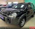 Черный Хендай Туксон, объемом двигателя 2 л и пробегом 160 тыс. км за 8800 $, фото 1 на Automoto.ua