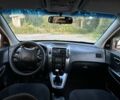 Черный Хендай Туксон, объемом двигателя 2 л и пробегом 200 тыс. км за 7500 $, фото 4 на Automoto.ua