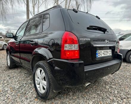 Черный Хендай Туксон, объемом двигателя 2 л и пробегом 166 тыс. км за 7500 $, фото 3 на Automoto.ua