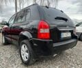 Черный Хендай Туксон, объемом двигателя 2 л и пробегом 166 тыс. км за 7500 $, фото 3 на Automoto.ua