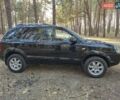 Чорний Хендай Туксон, об'ємом двигуна 2 л та пробігом 201 тис. км за 8999 $, фото 3 на Automoto.ua