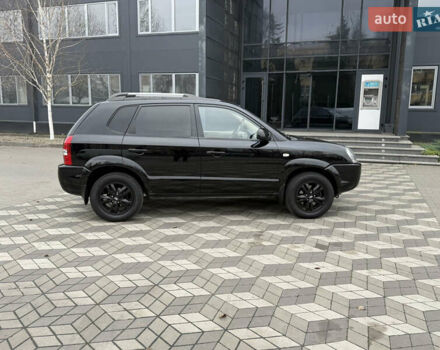 Черный Хендай Туксон, объемом двигателя 2 л и пробегом 191 тыс. км за 8500 $, фото 11 на Automoto.ua