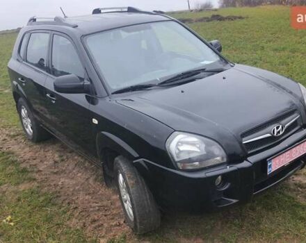 Черный Хендай Туксон, объемом двигателя 2 л и пробегом 198 тыс. км за 8200 $, фото 9 на Automoto.ua