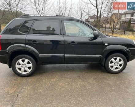Черный Хендай Туксон, объемом двигателя 2 л и пробегом 128 тыс. км за 9200 $, фото 6 на Automoto.ua