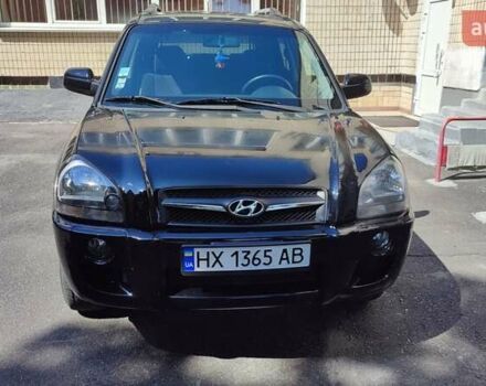 Чорний Хендай Туксон, об'ємом двигуна 2 л та пробігом 157 тис. км за 10000 $, фото 4 на Automoto.ua