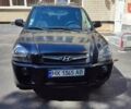 Чорний Хендай Туксон, об'ємом двигуна 2 л та пробігом 157 тис. км за 10000 $, фото 4 на Automoto.ua