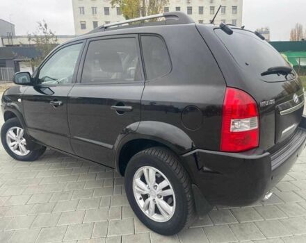 Черный Хендай Туксон, объемом двигателя 2 л и пробегом 168 тыс. км за 7500 $, фото 5 на Automoto.ua