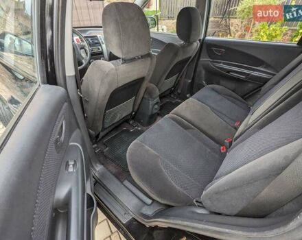 Чорний Хендай Туксон, об'ємом двигуна 2 л та пробігом 217 тис. км за 7700 $, фото 12 на Automoto.ua