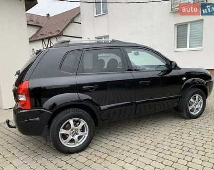 Черный Хендай Туксон, объемом двигателя 2 л и пробегом 114 тыс. км за 8850 $, фото 7 на Automoto.ua