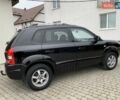 Черный Хендай Туксон, объемом двигателя 2 л и пробегом 114 тыс. км за 8850 $, фото 7 на Automoto.ua