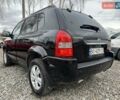 Чорний Хендай Туксон, об'ємом двигуна 2 л та пробігом 166 тис. км за 7500 $, фото 2 на Automoto.ua
